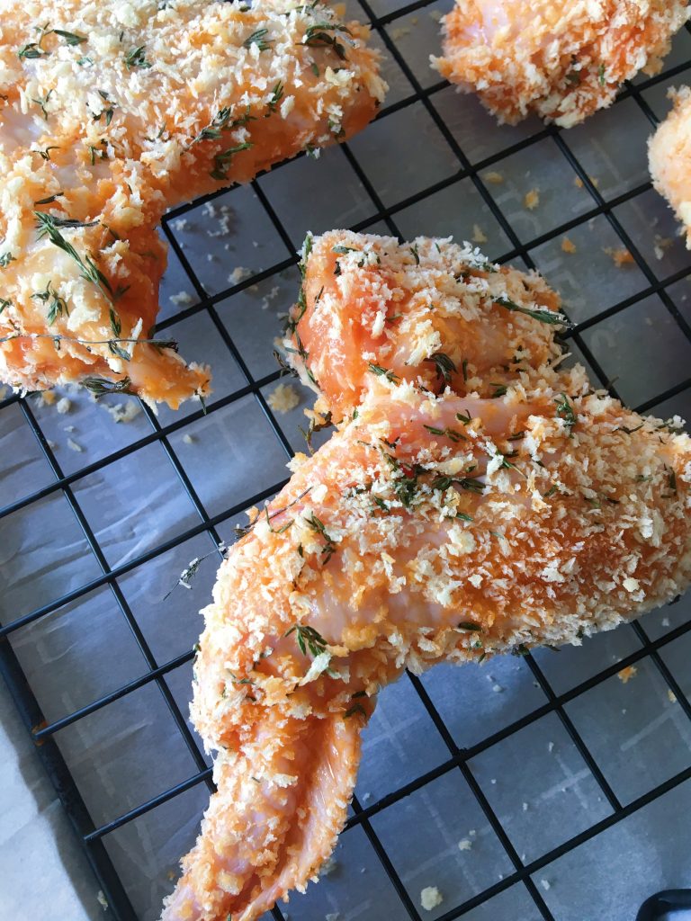 Miso and Thyme Crispy Baked Chicken Wings on baking rack ready to go into the oven