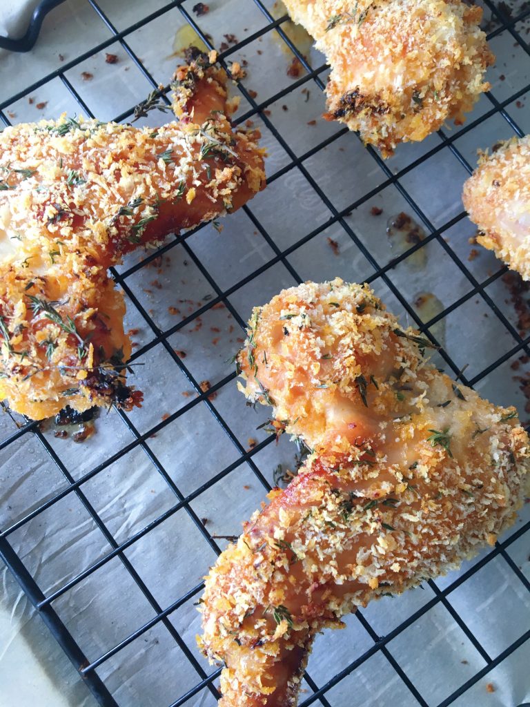 Miso and Thyme Crispy Baked Chicken Wings on a baking rack fresh from the oven